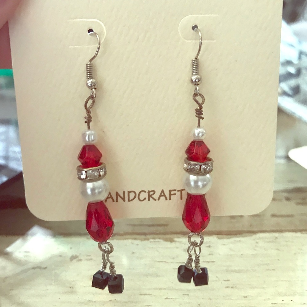 Handcrafted dangle earrings.